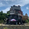 ま