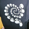 つ