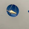 マ