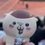 こむお